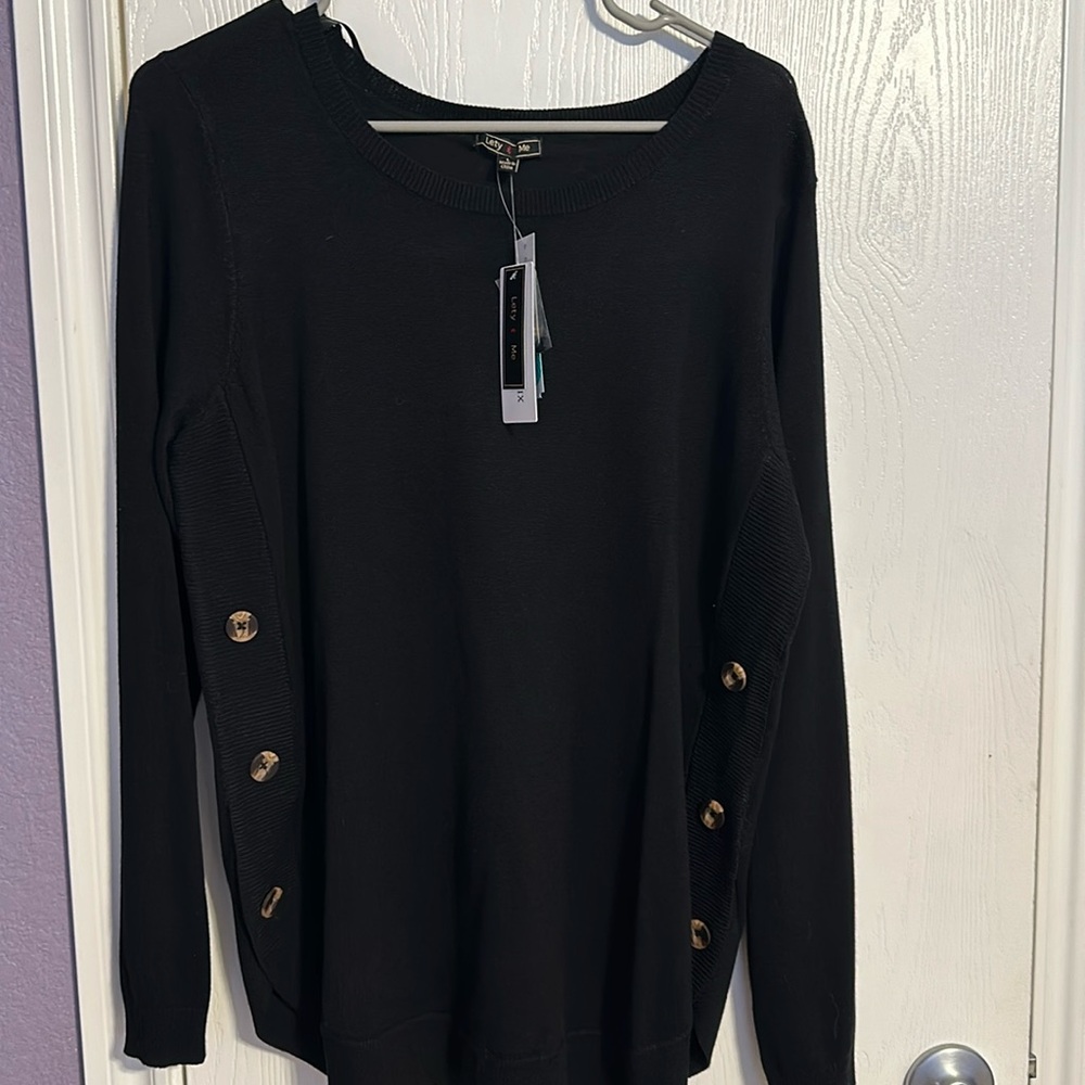 Black sweater with decorative buttons on sides